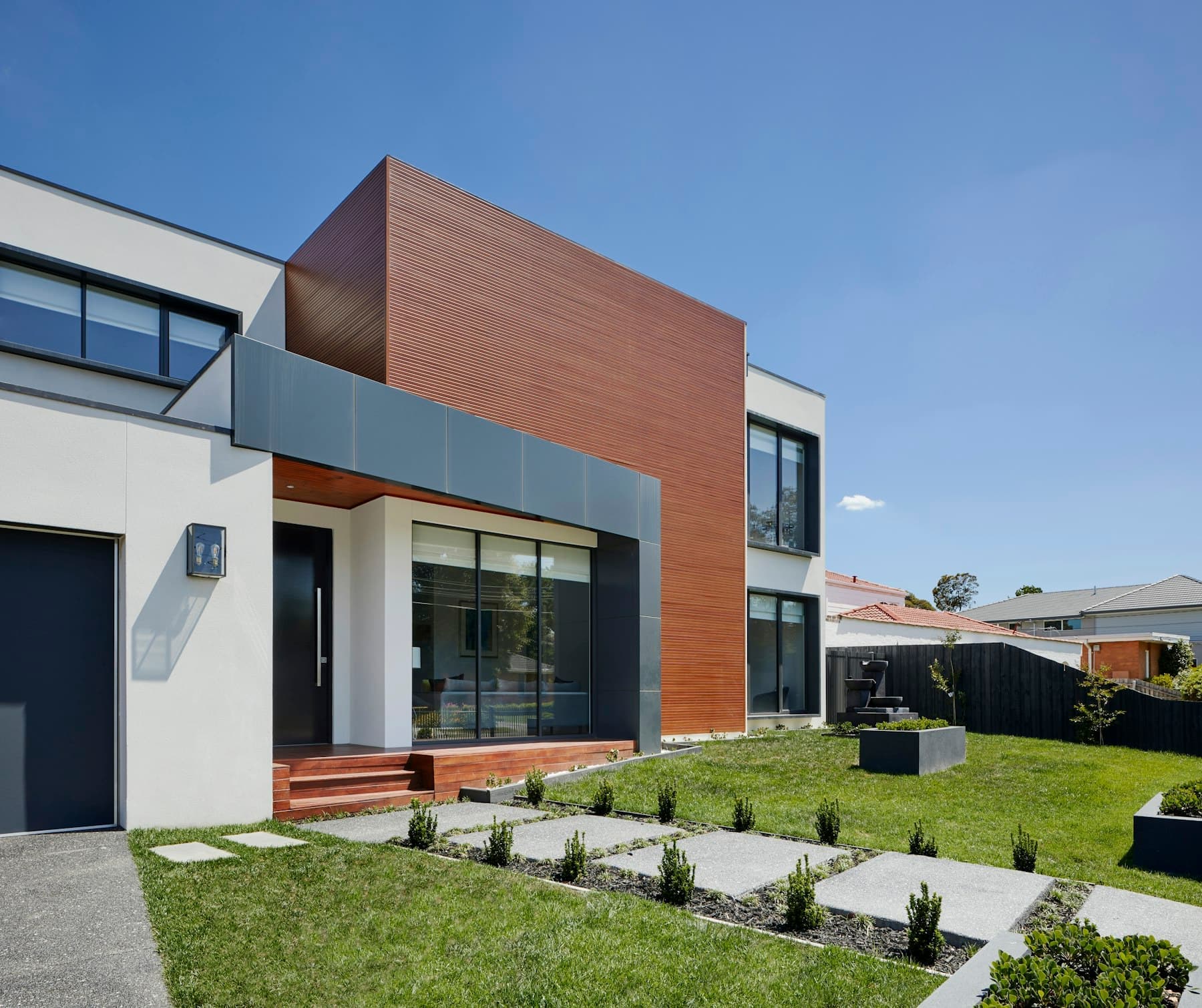 Contemporary brick and timber residential building exterior